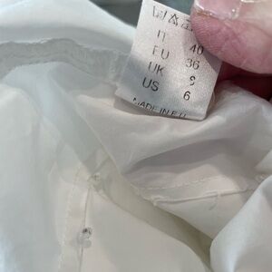 BALOSSA White HightLow Button Up Cuff Sleeve Collar
Blouse Oversize 6
Beautiful
